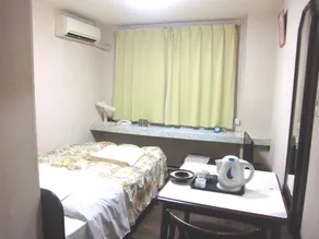 Sunshine Hotel - Chambre
