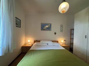 Relax in quiet accommodation in Bibione Pineda - Chambre