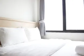 Signature 2BR at Apartment Tamansari Panoramic By Travelio - Chambre