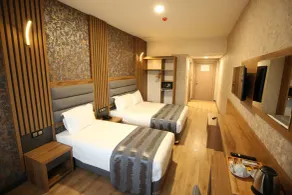 Büpa Plus Hotel - Chambre