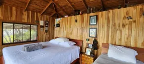 Teak house in a forest above the beach - Camera