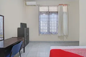 Hotel O Lavina Guesthouse - Chambre