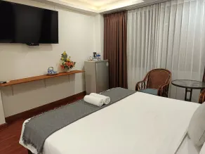 Longzhu Guesthouse - Chambre