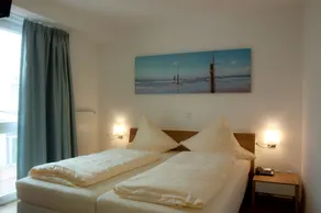 Apartments Boardinghaus Norderney - Chambre