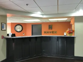 Haven Inn & Suites - Borne des arrivées/des départs