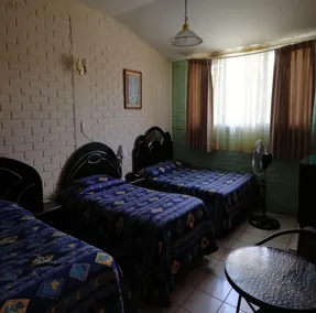 Mariana's Petit Hotel - Room