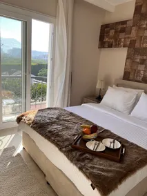 B. Equine Range Hotel - Room