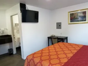 Travis Lodge Motel 16 - Værelse