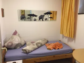 Magnifico appartamento accogliente e familiare con giardino | Vista sul giardino | Ammette cani - Camera