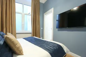 Pink Grapefruit City Condo - Quarto