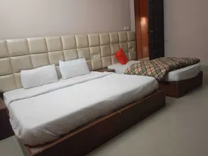 Hotel Queens Pearl Inn - Chambre