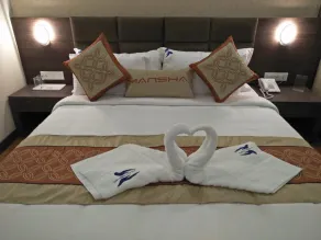 Hotel Mansha Regency - Chambre