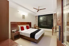Capital O Elegant Amethyst Business Hotel Near Ragigudda Sri Prasanna Anjaneyaswamy Temple - Rom