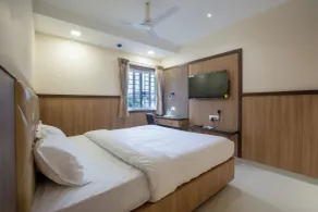 Hotel PRM Aruna Archadia - Room