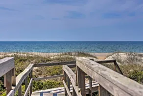 Oceanfront corner condo with balcony, washer/dryer, AC, & pool access - Interior