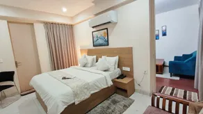 La Cozy Residency - Vista do quarto