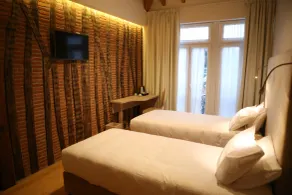 Muralha Charm House - Chambre