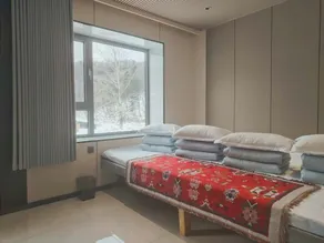 Xuegu Xinfu Guest House - Chambre