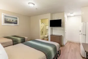 HomeTowne Studios by Red Roof Orlando - Casselberry - Chambre