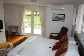 Paheke Boutique Lodge - Zimmer