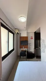 De La Charis Hotel - Habitación