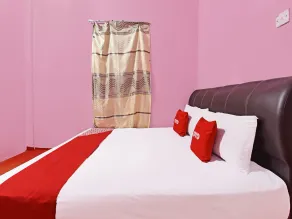 Capital O 90664 Rabi Hotel - Chambre