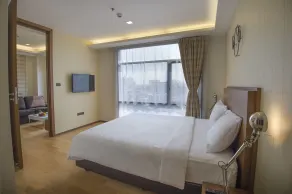 Marvin Suites Hotel - Chambre