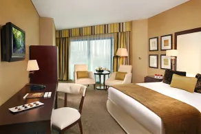 Mövenpick Grand Al Bustan - Zimmer