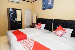 Super OYO 598 Udan Mas Guesthouse& Gallery - Habitación