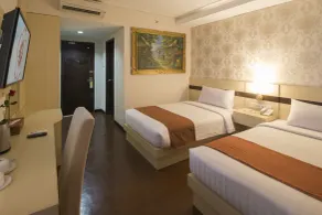 Grand Puri Saron Hotel Yogyakarta - Zimmer