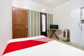 OYO 91827 Tutus Homestay Syariah - Habitación