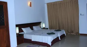 The Coconut Gardens Hotel & Restaurant - Chambre