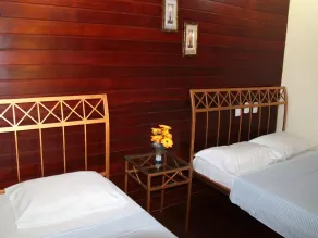 Praia da Costa Suítes - Room
