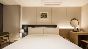 The First Stay Hotel - Room