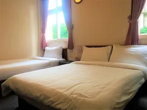 Rich Zone Hotel - Chambre