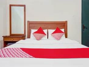 Hotel O 90596 Hotel Griya Astoeti - Habitación