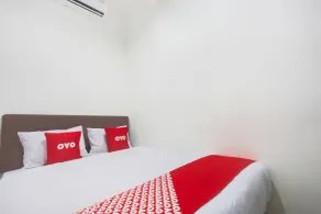 Citara Jaya Guesthouse Mitra RedDoorz - Habitación