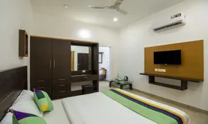 Treebo Majestic Retreat - Quarto
