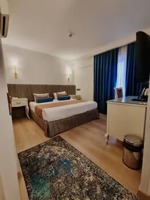 Taximtown Hotel - Chambre