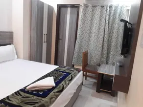 LS Grand Guest House - Chambre