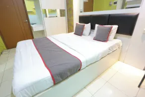Hotel O Ciputat Near Apartment Green Lake View Ciputat - Room