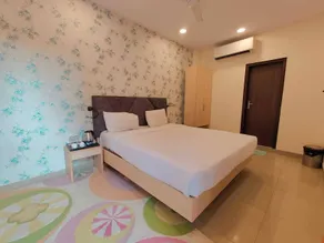 Signature Luxe Inn Hotel - Camera