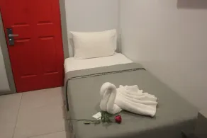 ML SUITES CEBU - Værelse