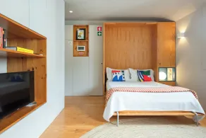 Baumhaus Serviced Living - Art & Design Apartments - Chambre
