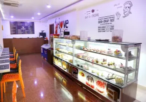 Triguna Clarks Inn Kurnool - Restaurante