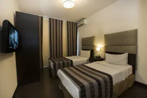 Orient Queen Homes Hotel - Room