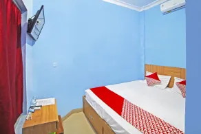 Hotel O Gurusinga Guesthouse - Chambre