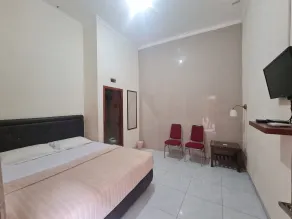 OYO Life Arjuna Guest House Syariah - Habitación