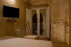 L'Hotel In Pietra - Zimmer