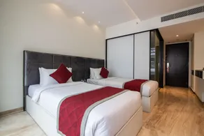 Bhagini Icon Premier Hotel - Room